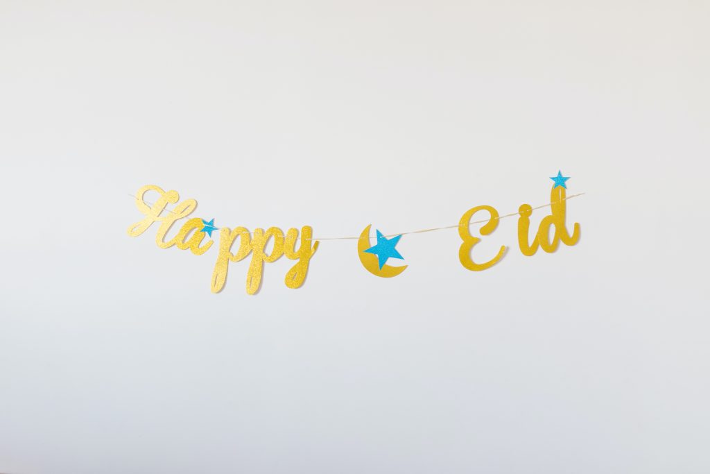 happy eid writing on wall